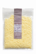 Queso rallado x 250g Toledales sobre fondo blanco